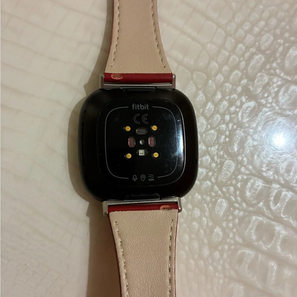 Fitbit Smartwatch with Red Strap
